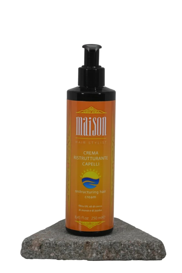 Crema ristrutturante capelli con filtro UV, oli di cocco, monoi e jojoba.